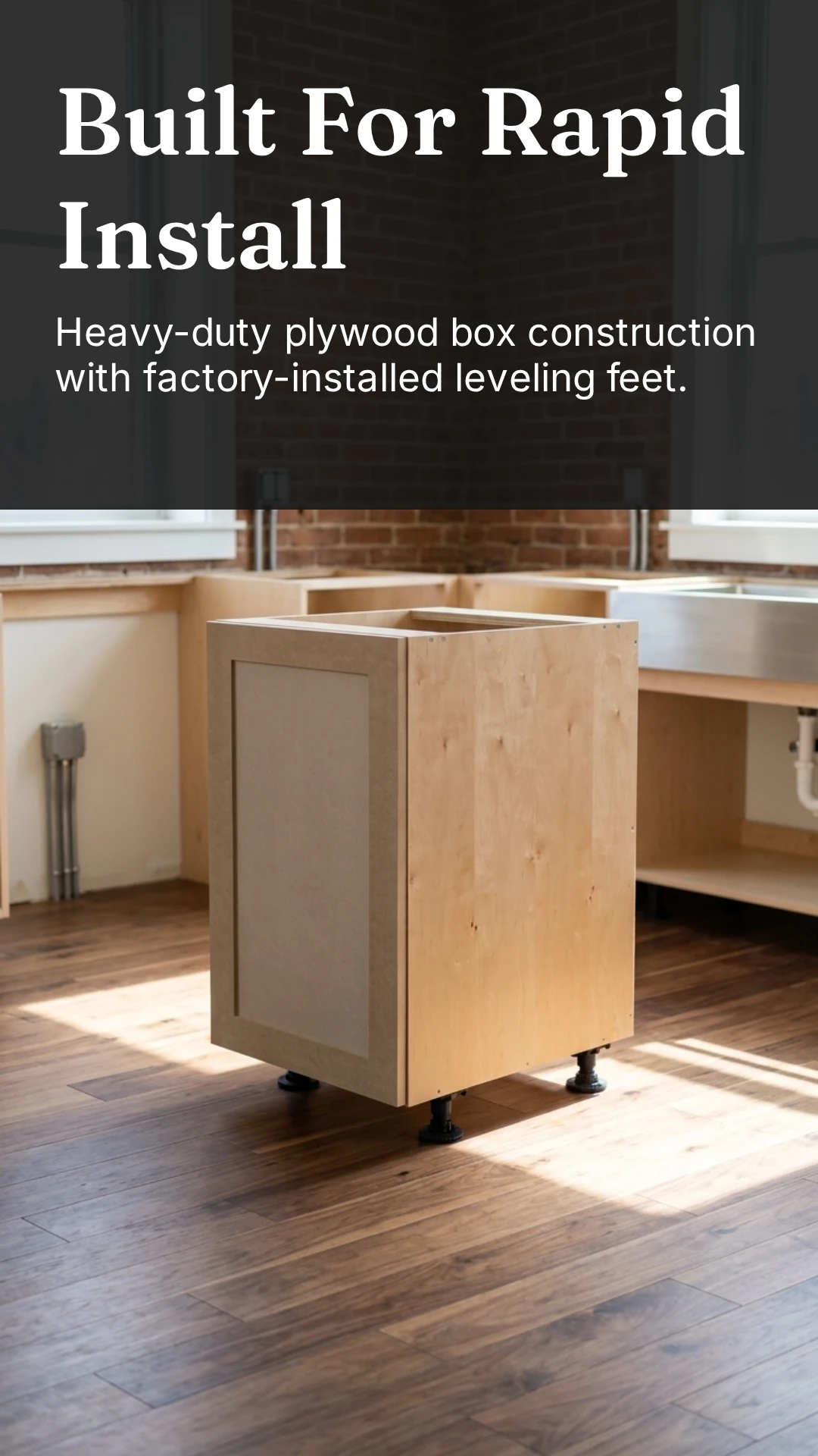 Built for rapid install: heavy-duty plywood box construction with factory-installed leveling feet. A raw plywood base cabinet with a shaker door, standing on black leveling feet.